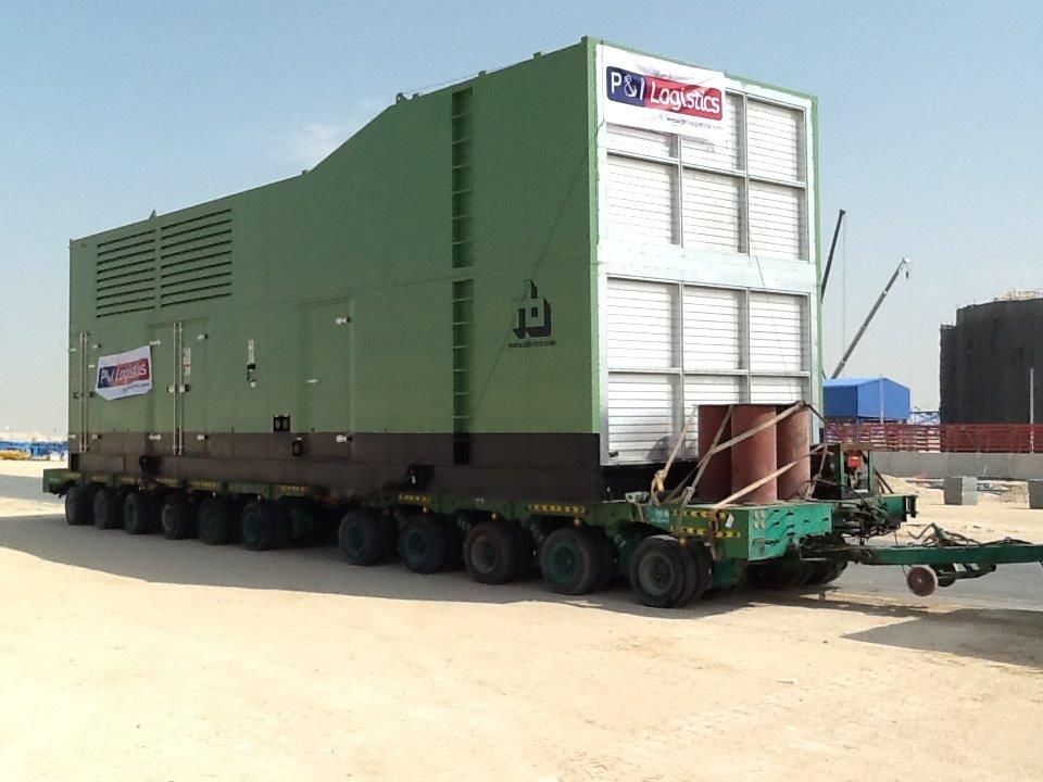 project logistics photo - 1 - Transportation of Generator sets from CAT (Al Bahar) yard using special trailer in Sharjah and delivery up to Abu Dhabi midfield airport site including offloading onto foundation